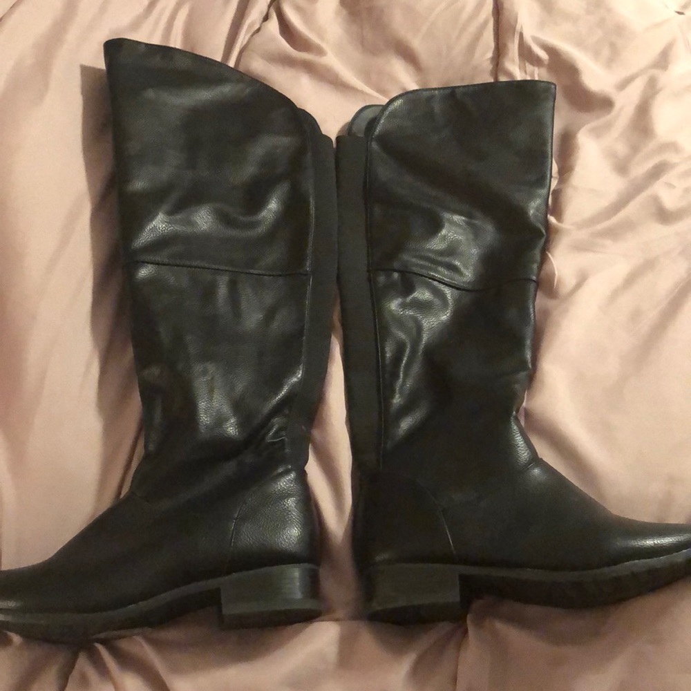 Above knee black leather boots